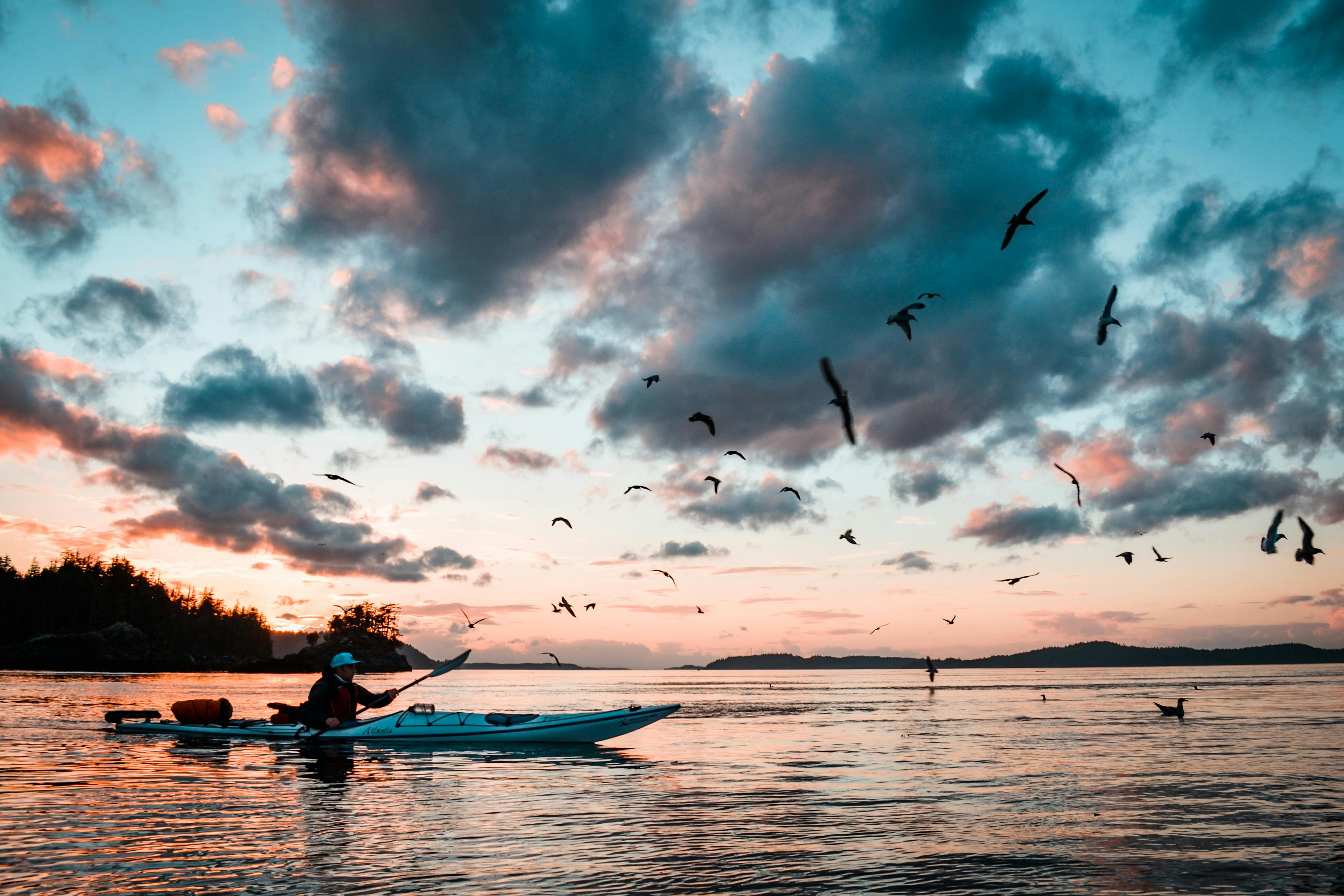 Enjoying calm sea during night kayaking